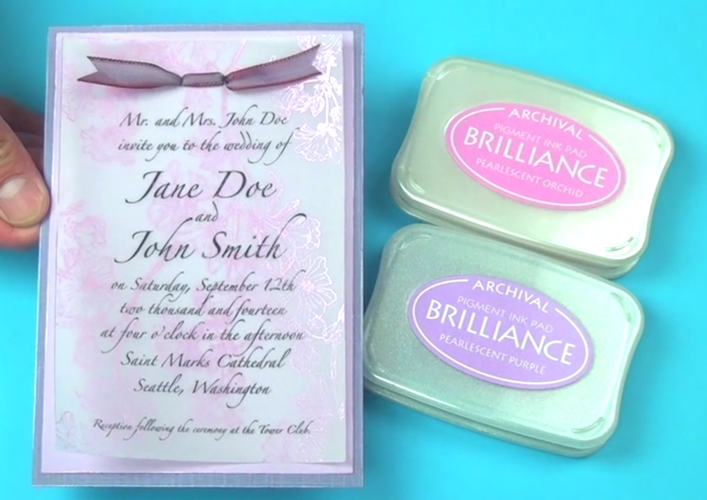 A pink and purple wedding invitation handmade using Brilliance pearlescent pigment inks on vellum.